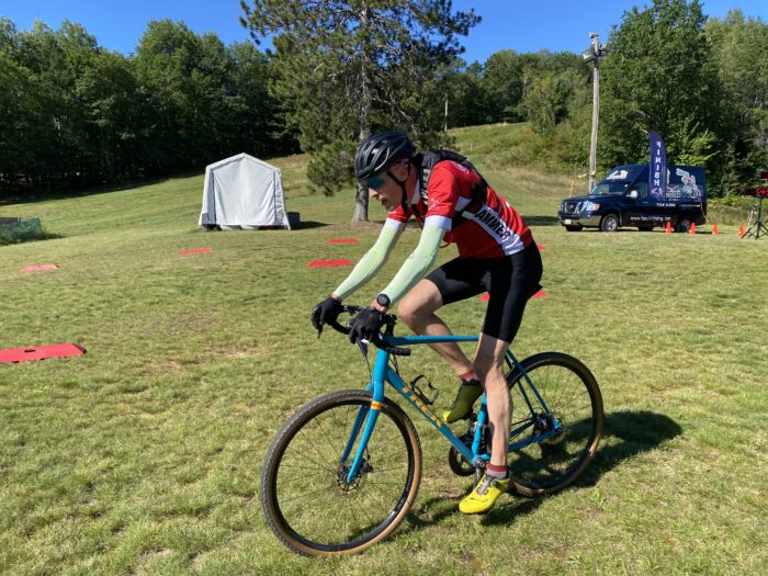 A gravel grind racer passes by the chalet during the 40 mile race.